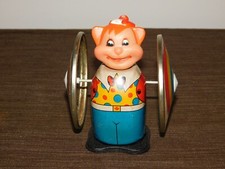 4 3/4" HIGH TIN WINDUP TOY
