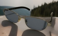 Calvin Klein CK1022 Sunglasses, Black Frames / Light Blue lens Made In Italy