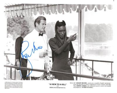 Roger Moore Signed Autograph 8x10 Photo - James Bond w/ Sexy May Day Grace Jones