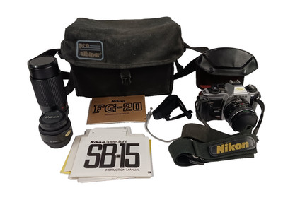 Nikon FG-20 Silver 35mm SLR Film Camera w/Nikon 50mm 1:1:8 Lens & 2 Addtl Lenses