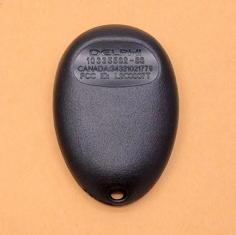 COMO NUEVO OEM GM PONTIAC BUICK OLDSMOBILE MANDO A DISTANCIA SIN LLAVE TRANSMISOR L2C0007T Foto 2 de 2