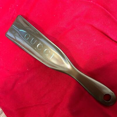 Gucci shoe horn gold/bronze unsiex adult