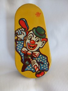 Vintage Oblong Tin Halloween Noisemaker,  plastic handle US Metal Toy MFG Co.