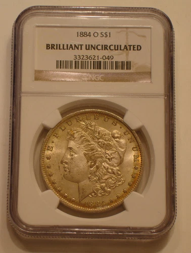 1884-O Morgan Silver Dollar NGC BRILLIANT UNCIRCULATED golden Rainbow TONE