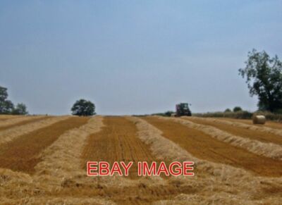 PHOTO  MAKING HAY WHILE THE SUN SHINES LOOKING SOUTH FROM THE FARM ROAD SERVING
