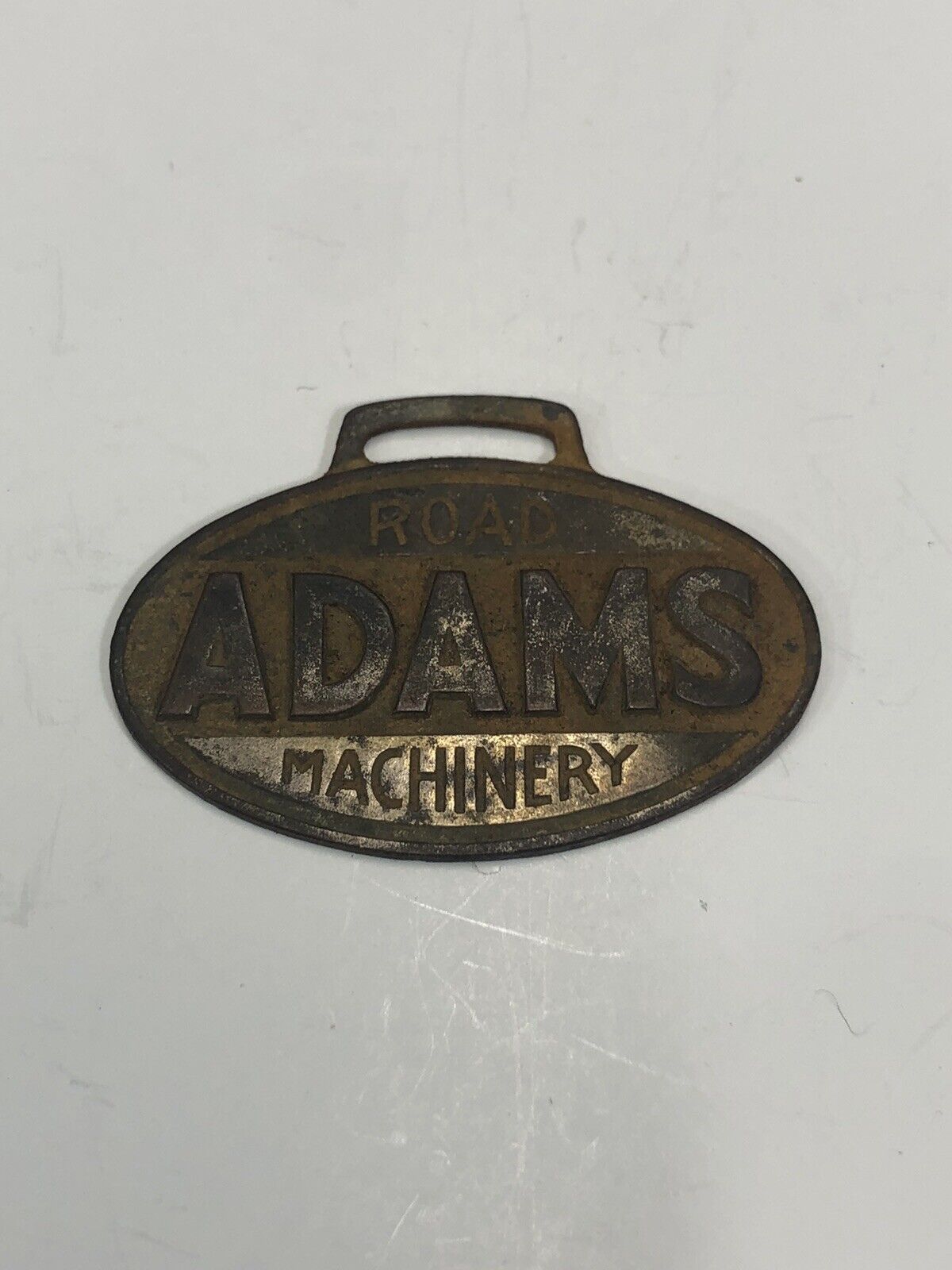 Vintage ADAMS ROAD MACHINERY Watch Fob Indianapolis,IND. (F2)