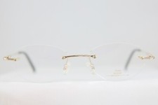 NOS NEW VINTAGE NEOSTYLE MOZART 1399 TITANIUM RIMLESS EYEGLASSES