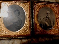 Two tintypes of man and woman in leather embossed case 