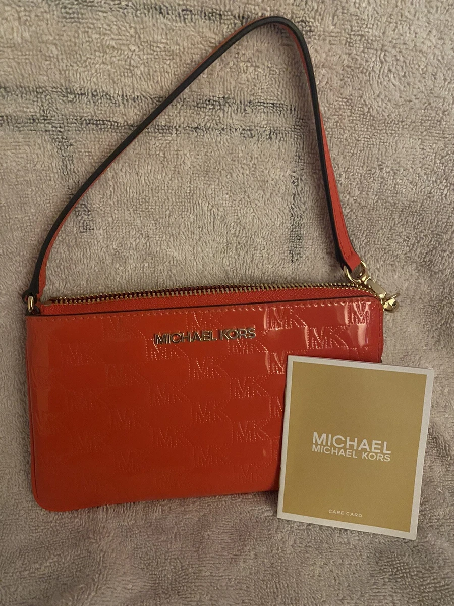 Red michael kors clutch sales