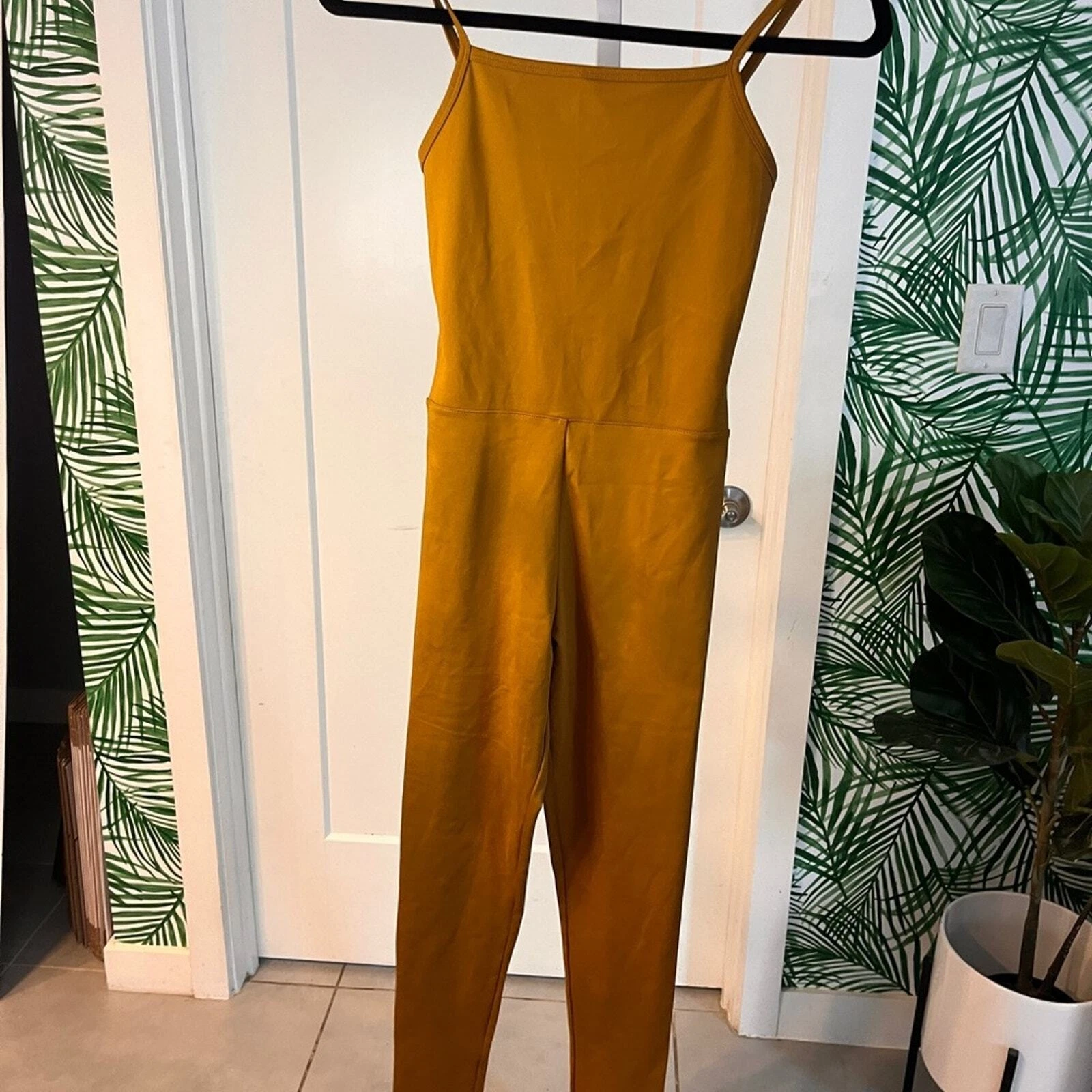 girlfriend-collective mustard one piece unitard 