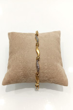 BRACCIALE  IN ORO GIALLO E BIANCO  18 CARATI SATINATO E TAGLIO DIAMANTATO 6 gr