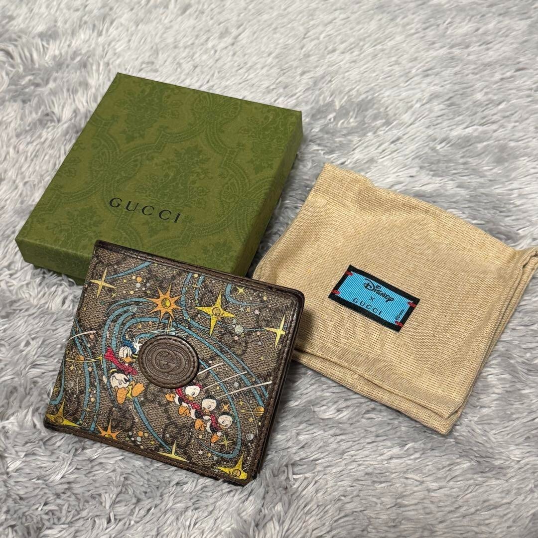 グッチ　ドナルド　財布 GUCCI WALLET DONALD DUCK GUCCI Disney Donald Duck Wallet Collaboration Holder GG