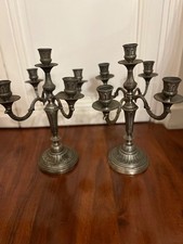 Paire de chandeliers En bronze argenté un style Louis XVI 