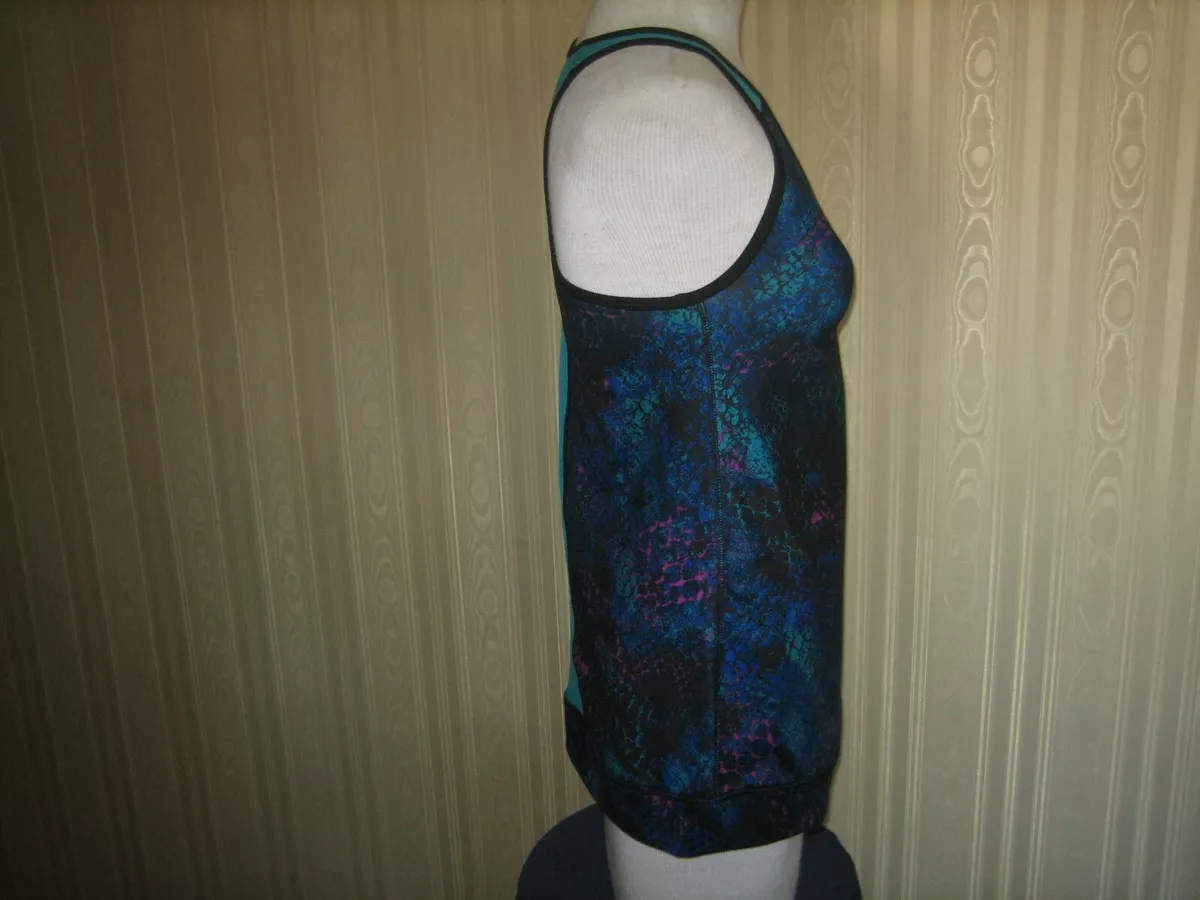 Champion built shop in bra tank
