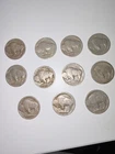 11 Buffalo Nickels, different years 1913-1938