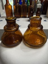 Two Amber Cone Ink Bottles