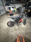 49cc 2-Stroke Mini Dirt Bike Mini Motorcycle, Black/Red, Integrated Footrest — photo 4