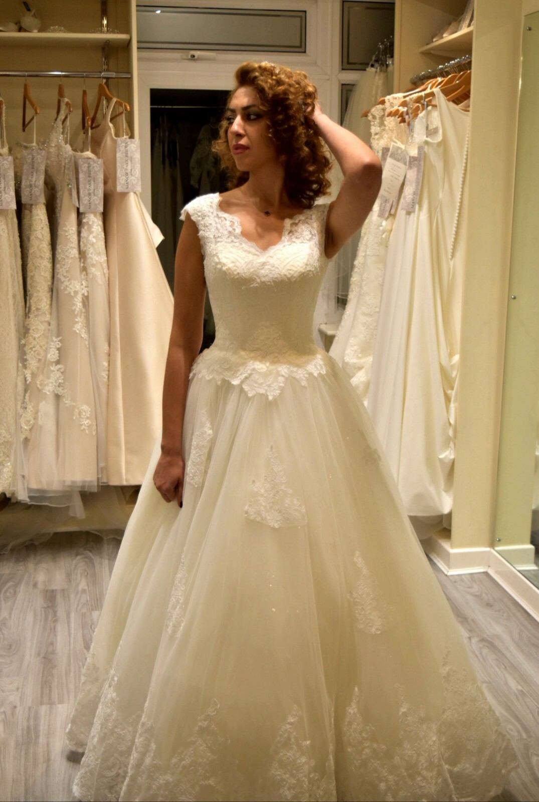 Wedding dress fit's size 10 to 14 Handmade in uk, only one made. It was £2400