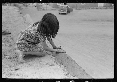 Photo:Costilla New Mexico Spanish-American Girl Plastering Adobe Roof 1940