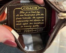 Coach Signature Brown Monogram Wristlet DO849-41637