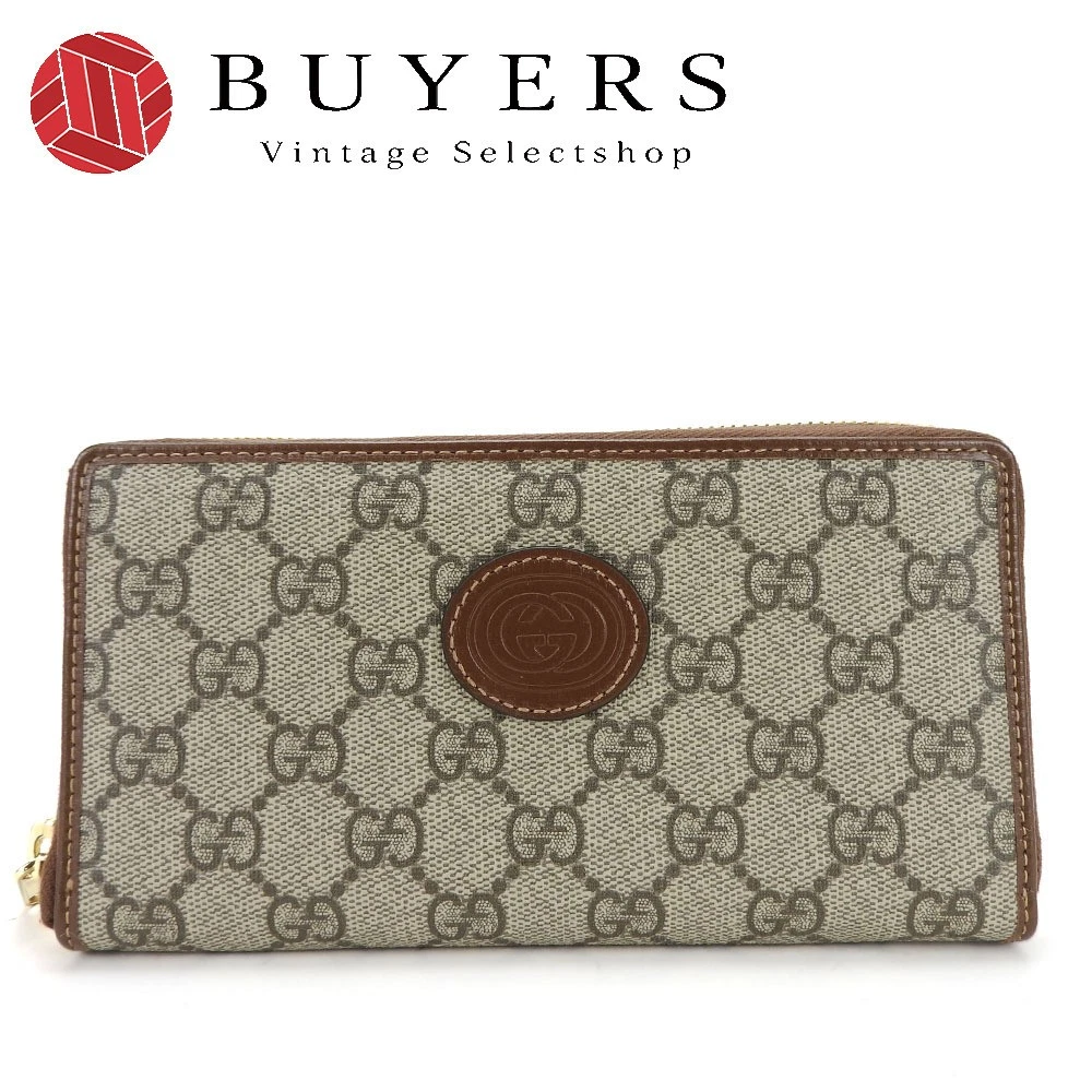 Portefeuille long Gucci d'occasion 673003 imbriqué G GG toile suprême beige marron gol