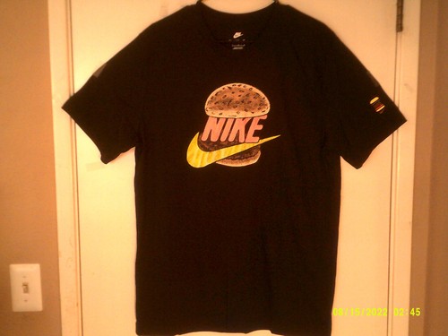 black and brown nike shirt