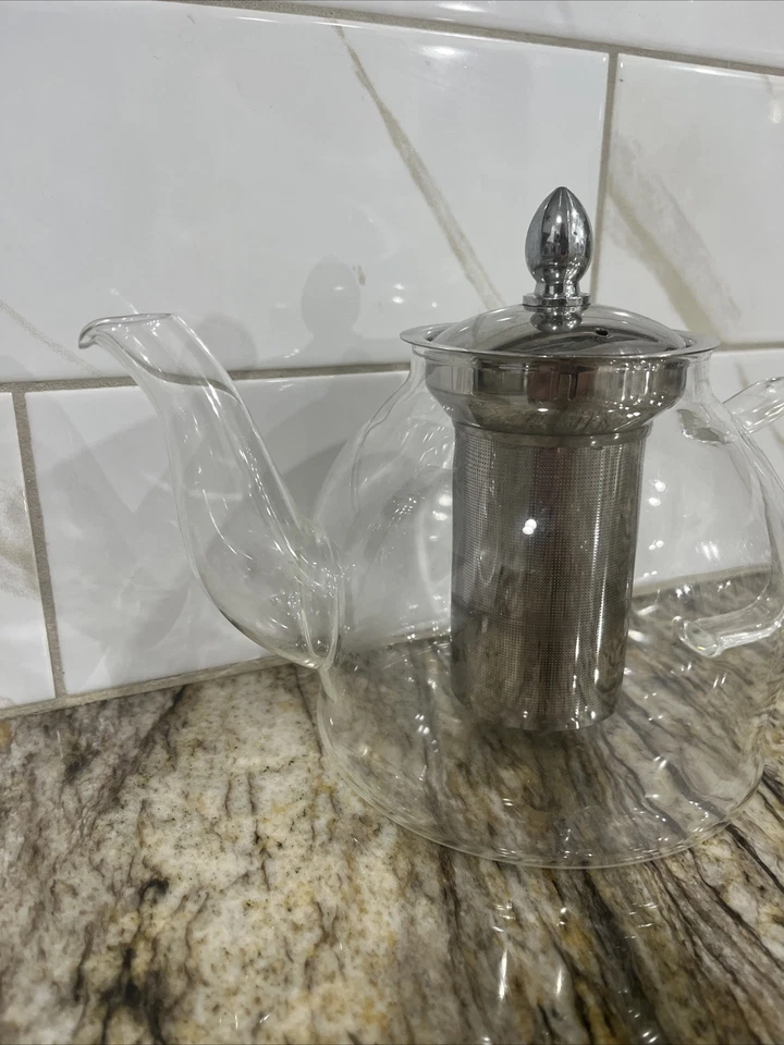 Tetera de vidrio con filtro extraíble de acero inoxidable 6 1/4" H usada en excelente estado Foto 2 de 4