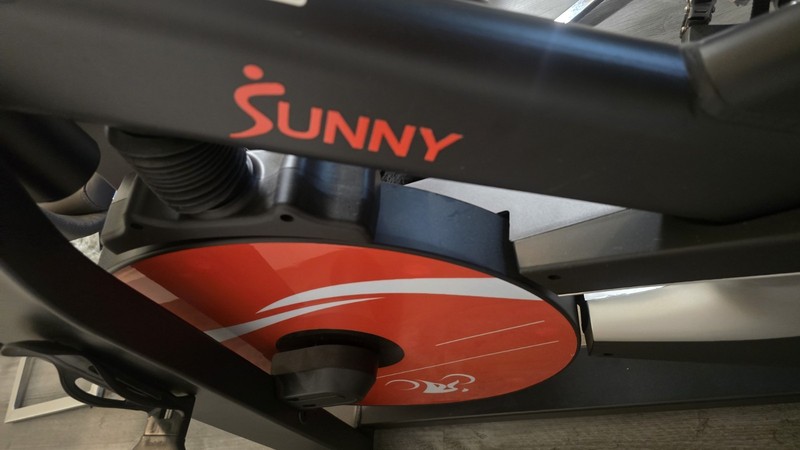Sunny Upright Indoor Exercise Bike, Adjustable Seat, Black/Red