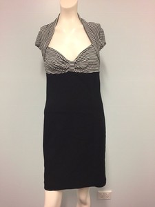 black skirt and white top