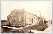 Byron Illinois~Kee & Chapell Dairy~Workman Loads Milk Cans~Water Tower~1912 RPPC