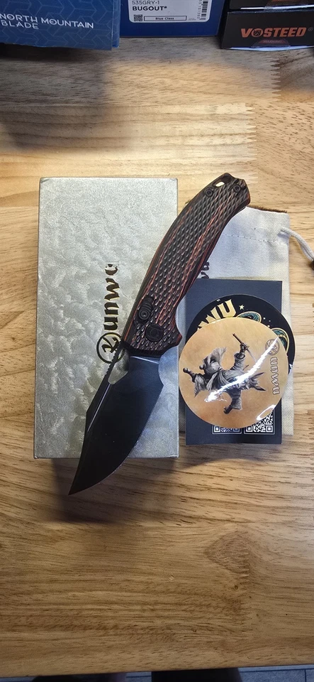 Cuchillo de bolsillo plegable Elmax Kunwu Knives Django XT Lock negro y rojo G10 X707A1 Foto 3 de 3