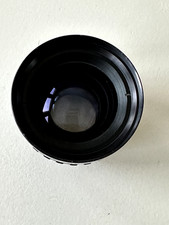Objectif noir de l’appareil photo Canon en niveaux de gris photo