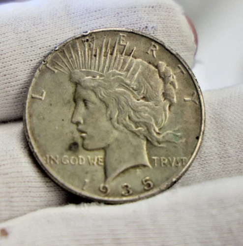 1935 US Peace Silver Dollar $1 XF (Cleaned, Retoned,Rim Nick)
