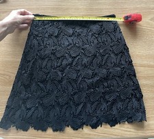 Express women's black lace skirt, size 2 with a side zip