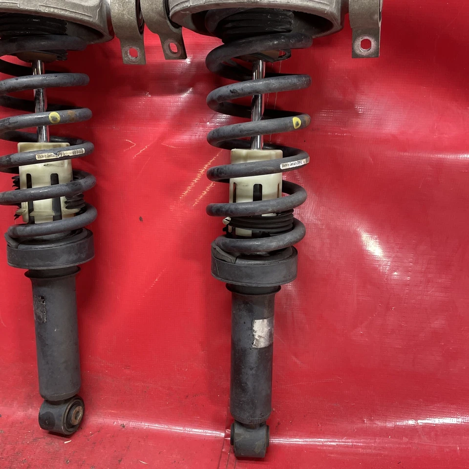 Par de puntales de amortiguador de suspensión trasera estándar izquierda y derecha Audi Q7 2009 OEM Foto 4 de 4