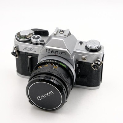 Canon AE-1 + FD 50mm 1,8 - 1 Jahr Gewährleistung - Fotofachhändler