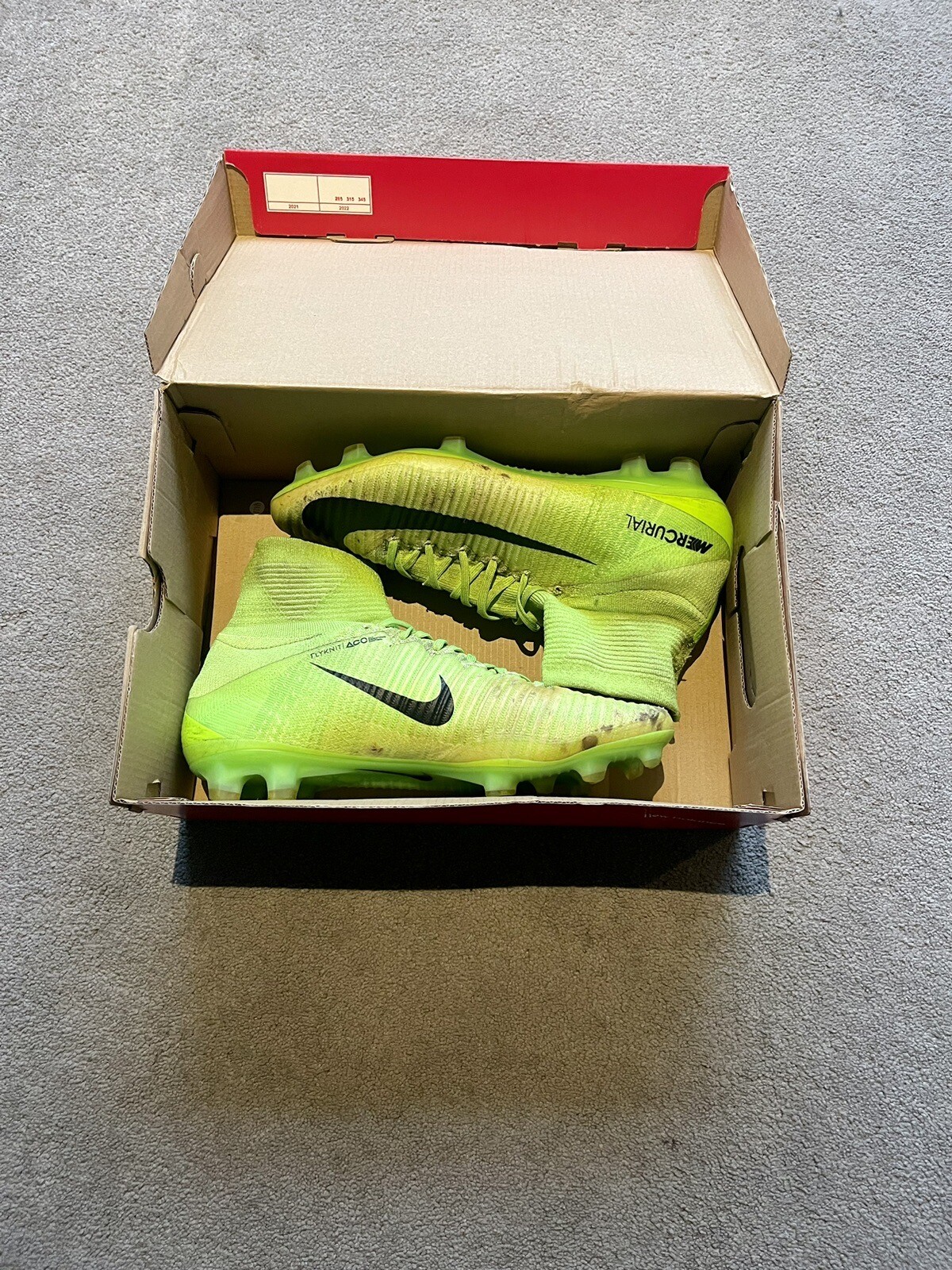 nike grey and green football boots