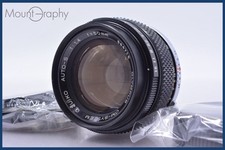 Operation d Olympus OM SYSTEM G.ZUIKO AUTO S 50mm F1.4 with front and rear caps