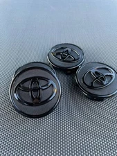 TOYOTA SET OF 4 BLACK 57mm/2.24in Wheel Center Caps