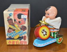 VTG Tin Wind Up Toy Child Beating Drum by CLOCKWORK NOS