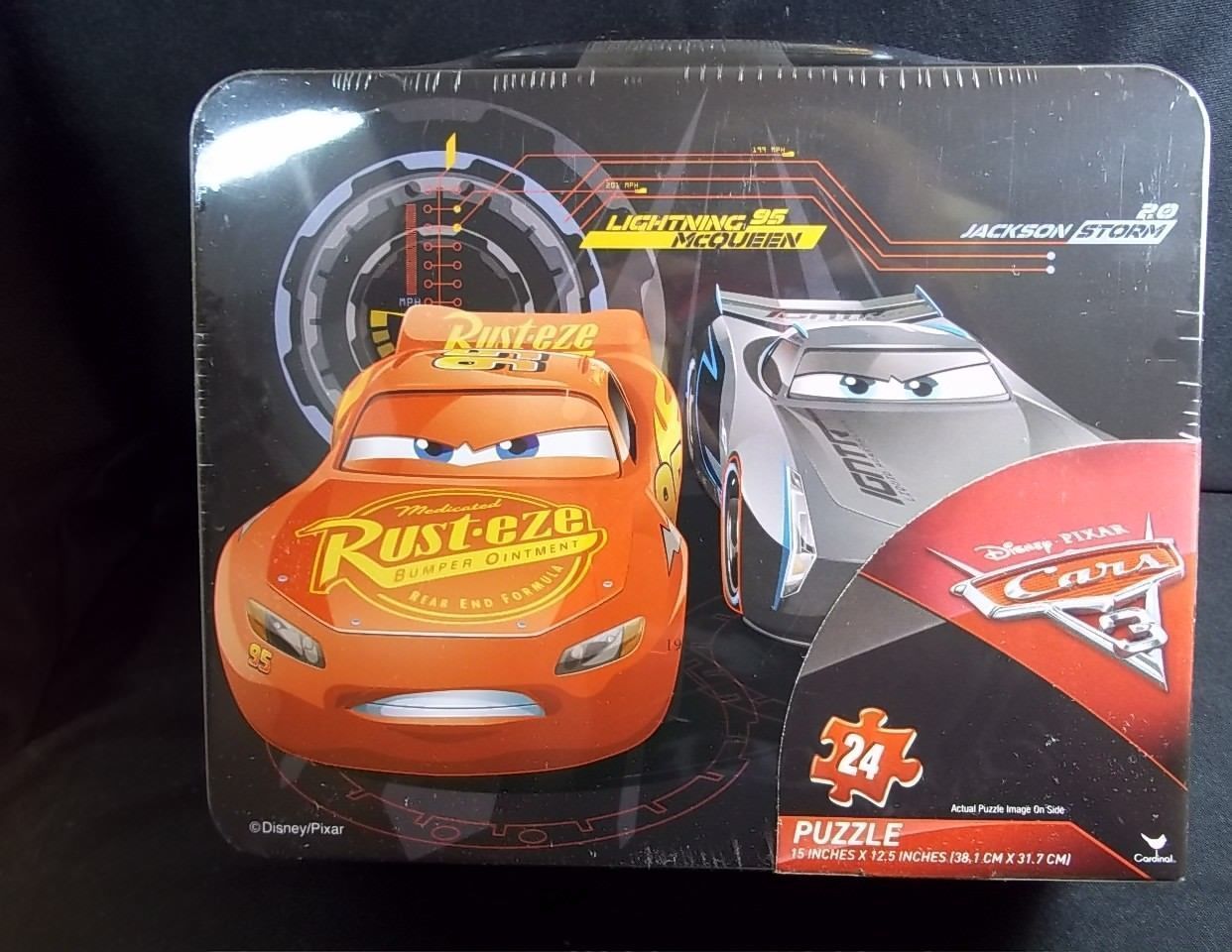 Pixar CARS puzzle in 3D tin suitcase lunchbox 24 pcs McQueen & Storm ...