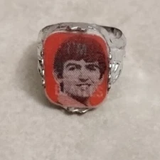 1960's "The BEATLES" Vari-Vue Motion Animation Flicker Ring Gum Ball GEORGE 