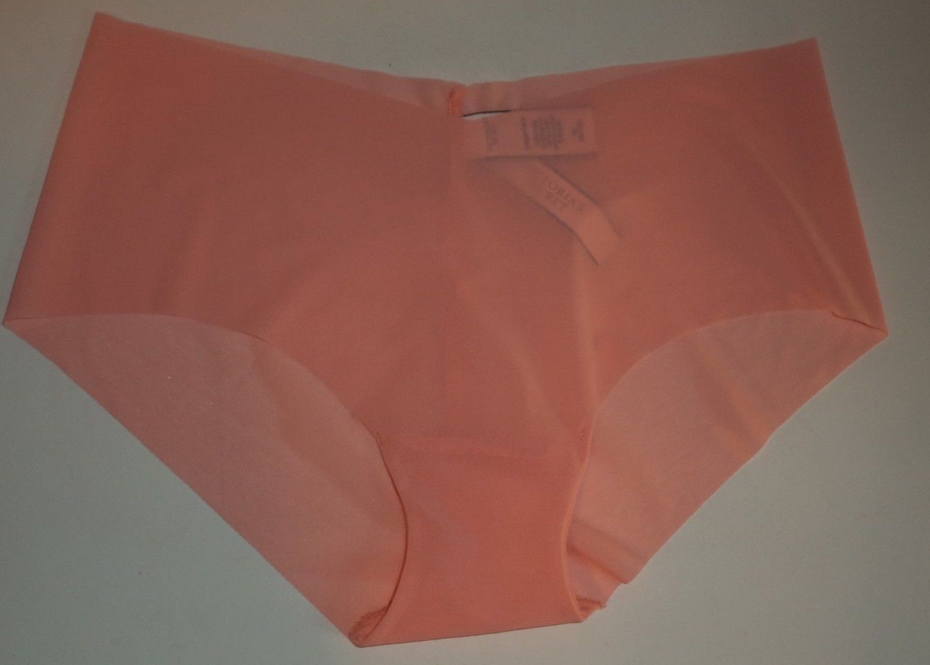 SEXY ILLUSIONS VICTORIA’S SECRET No Show Hiphugger Panty Size M Color Peach