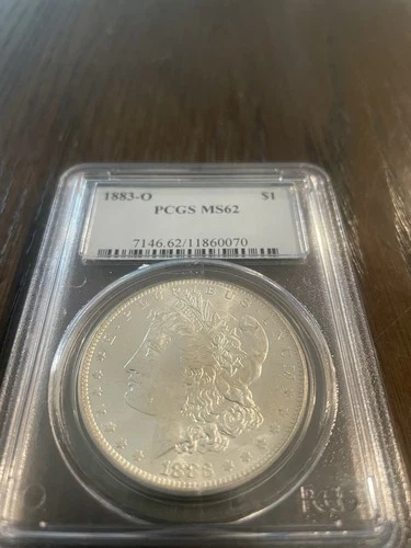 1883-O Morgan Silver Dollar PCGS MS62 – Brilliant UNC
