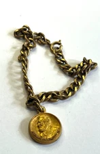 VINTAGE 10K O.C. Tanner Jewelry Co. "Alexander Graham-Bell" charm on Bracelet