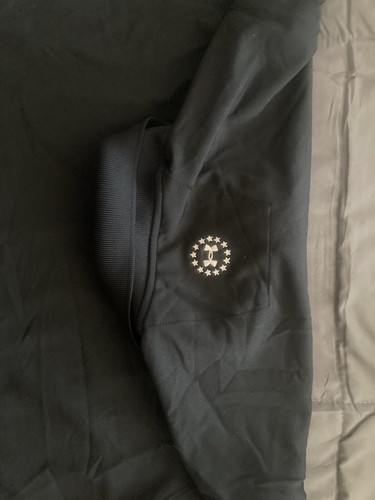 Camisa polo de golf Under Armour Wounded Warrior talla mediana negra - Imagen 3 de 3