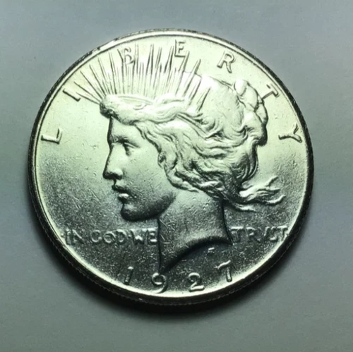 1927 ; $1 Peace Silver Dollar AU condition