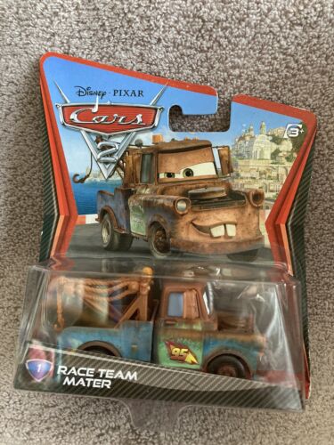 NOS 2010 Disney Pixar Cars 2 Race Team Mater Truck #1 New on Card #V2798 SEALED