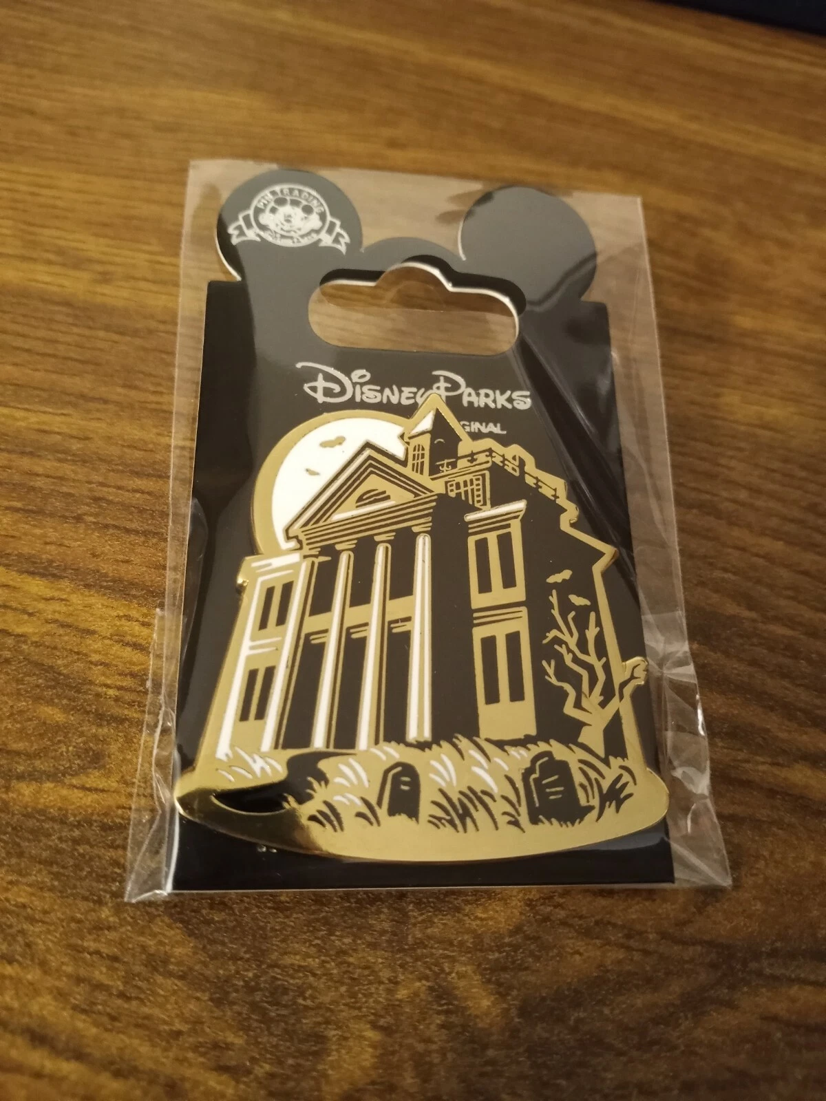 Disney Pin D23 Gold Member Haunted Mansion Pin with the tombs mansion
