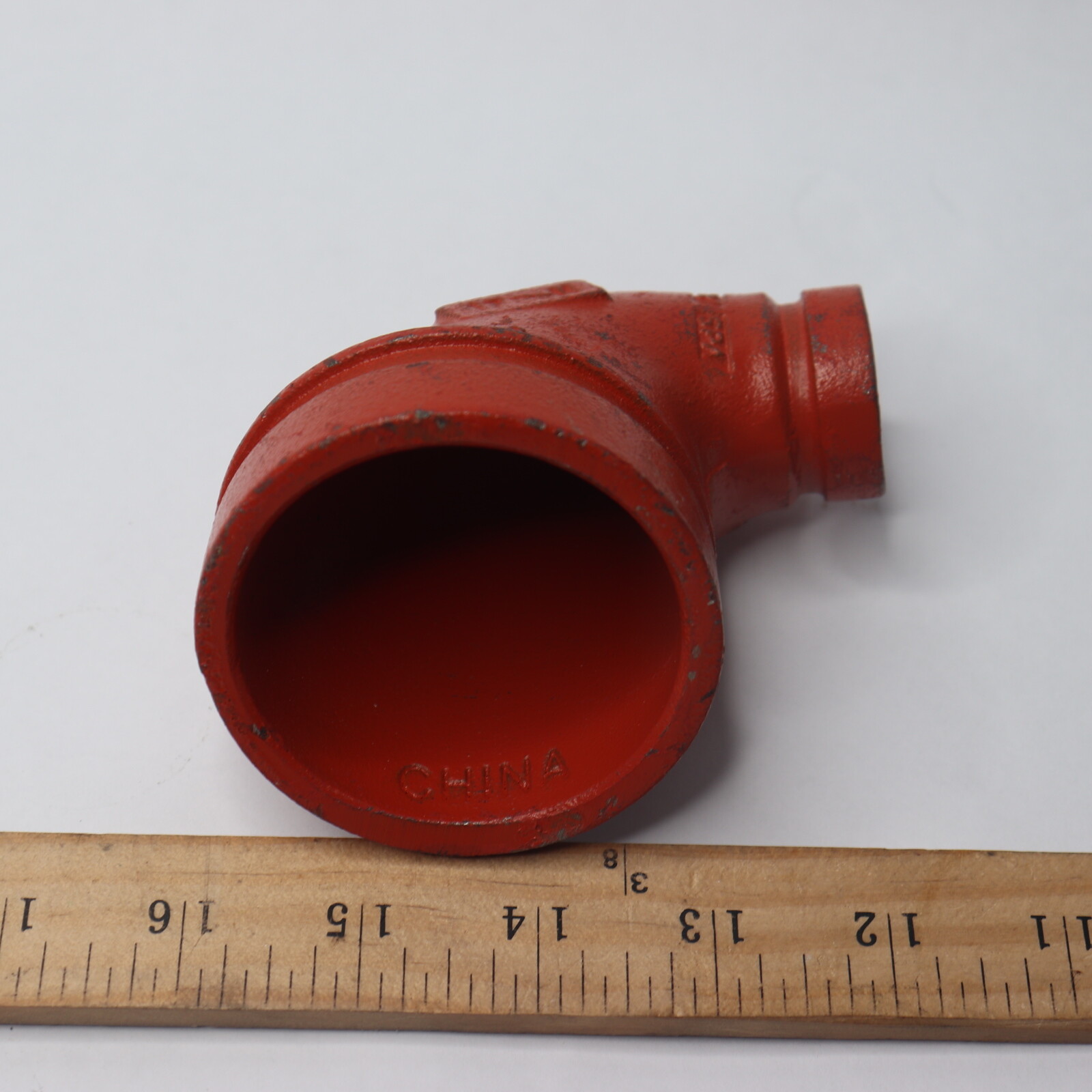 Victaulic 90 Degree Reducing Elbow Orange Enamel Ductile Iron 2-1/2